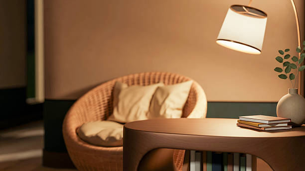 Warm amber table lamp illuminating a quiet reading corner